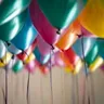 Calendar day 21: coloured balloons gathered against a ceiling
