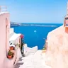 Calendar day 22: whitewashed steps winding down to a blue Greek bay
